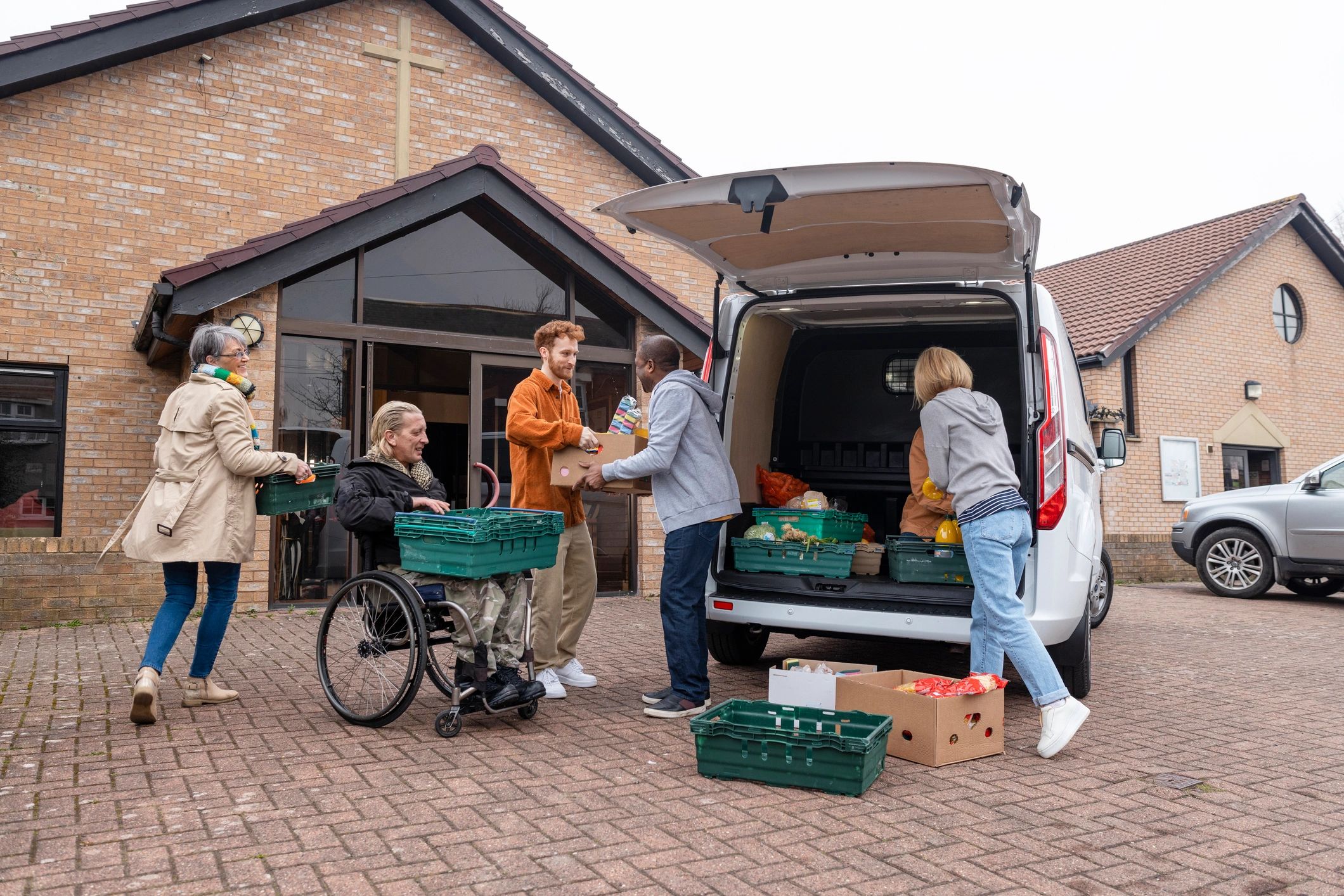 Volunteers unloading food donations for community outreach
